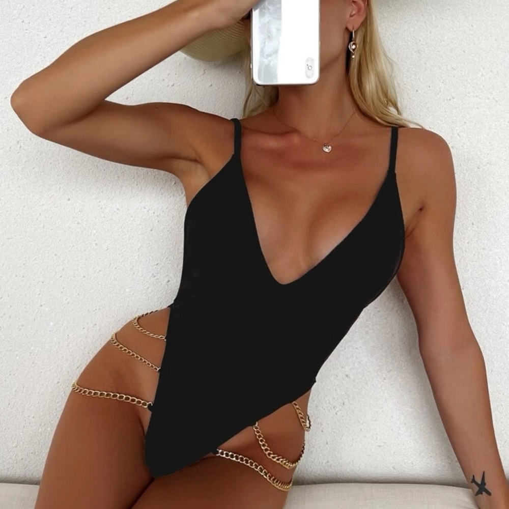One piece bathing suit with gold chains
